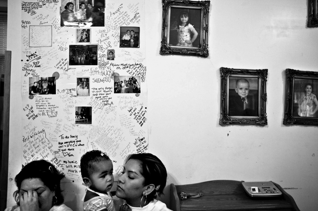 Members of the Cazares family mourn after their nephew, Juan, 14, was killed. Juan played basketball (sometimes with gang members) at Cornell Square Park in Chicago’s Back of the Yards neighborhood. Family members believe hanging out with the wrong people may have led to the eighth-grader’s death. New City, Chicago, 2009.