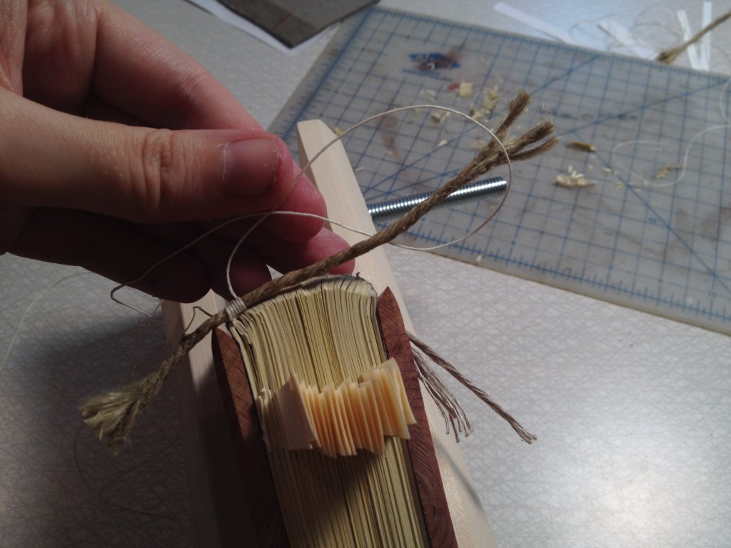 I sew the headbands onto a book that I'm learning to bind medieval style.