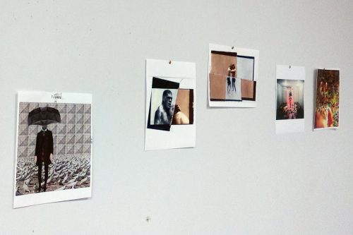 Doing a preliminary layout in my studio with print-outs of participating artist work.